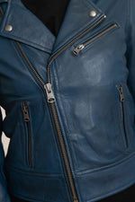 Deep navy lambskin leather jacket with a sleek biker cut. - Image n°2