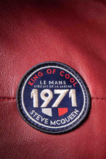 Dark red sheepskin jacket with tricolour stripes and zip pockets. - Image n°5