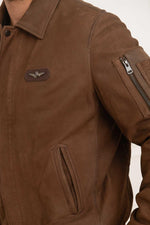 A suede sheepskin bomber in chocolate, cut for year-round versatility. - Image n°6