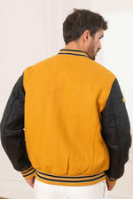 Schott's yellow cowhide varsity jacket with black leather sleeves. - Image n°5