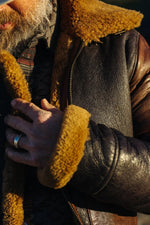 Tobacco-cognac lambskin bomber with warm shearling lining. - Image n°8