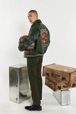 Forest green cowhide teddy with dragon embroidery and oversized fit. - Image n°8