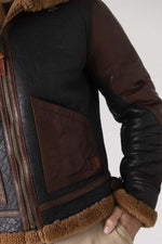 Tobacco-cognac lambskin bomber with warm shearling lining. - Image n°6
