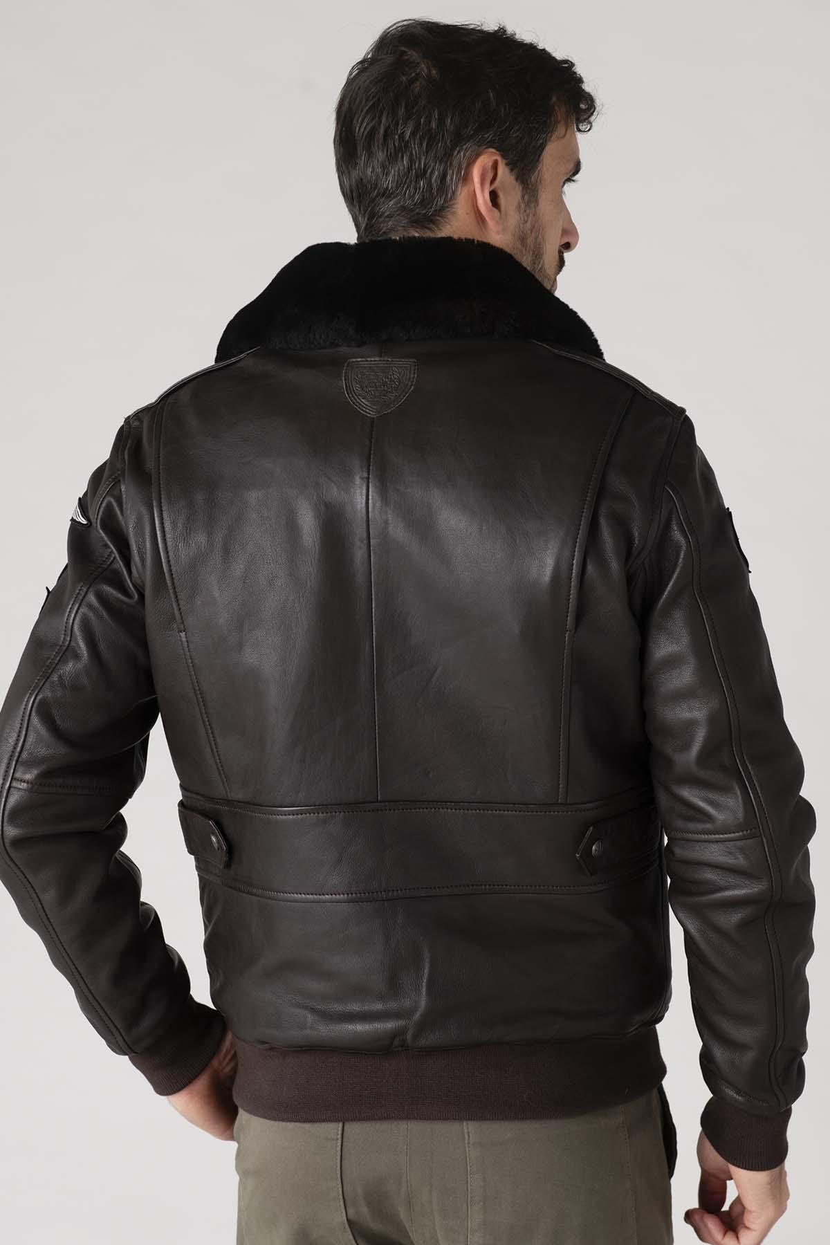 Dark brown sheepskin aviator jacket with RAF insignias and fur collar. - Image n°9