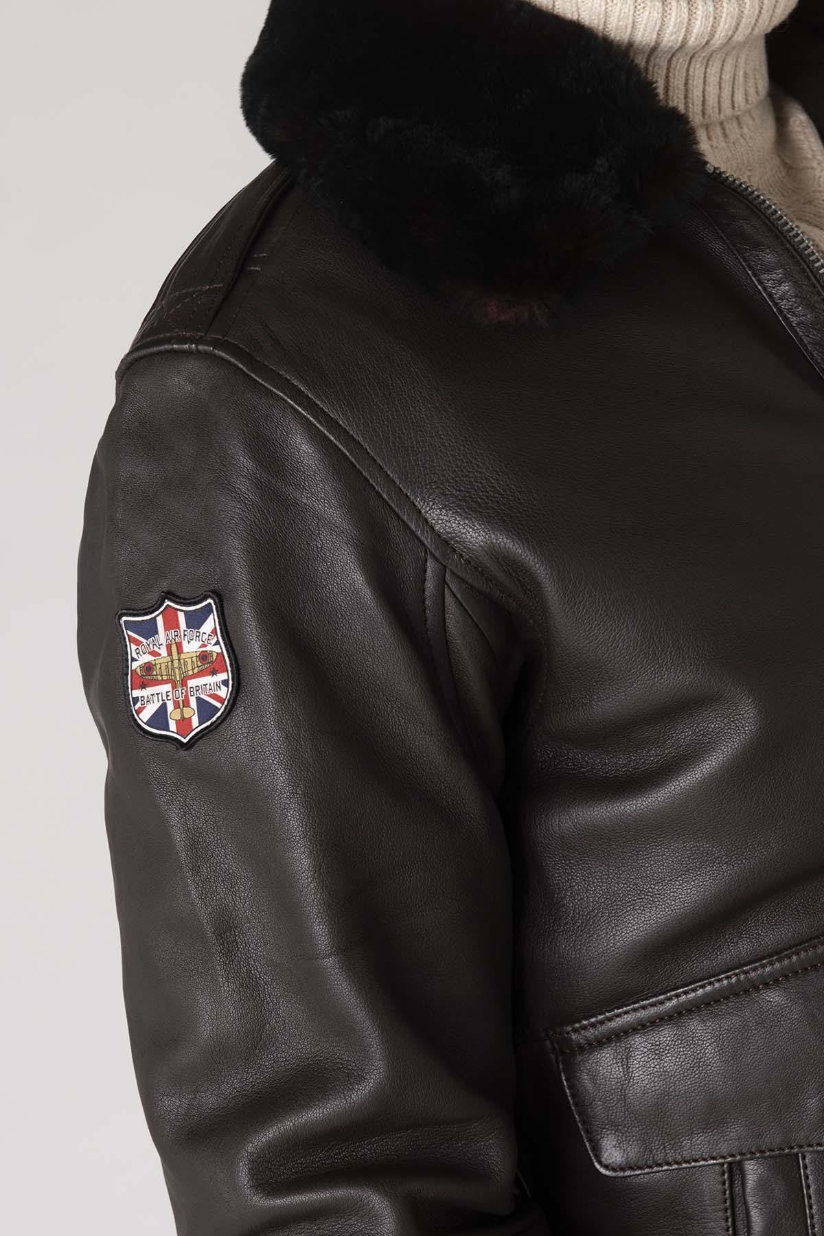 Dark brown sheepskin aviator jacket with RAF insignias and fur collar. - Image n°4