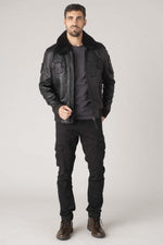 Black sheepskin aviator jacket with fur collar for warmth and style. - Image n°5