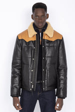 Schott's LCDAYTON: vachetta leather and shearling for winter warmth. - Image n°1