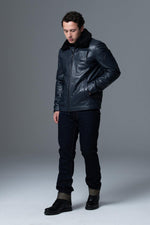 French navy lambskin jacket: aviator style, fur collar, zip pockets. - Image n°10