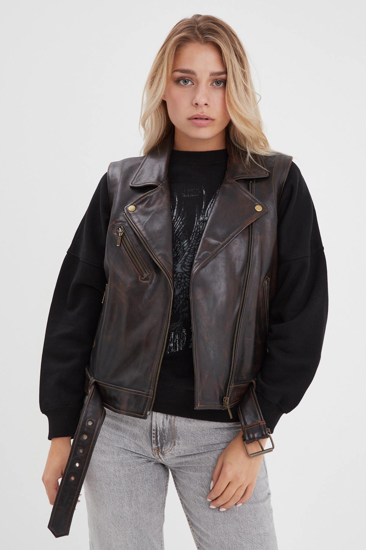 Bold sheep leather jacket in washed black and cognac, rock-inspired. - Image n°1