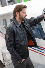 French aviator-inspired navy sheepskin jacket with a patinated finish. - Image n°12