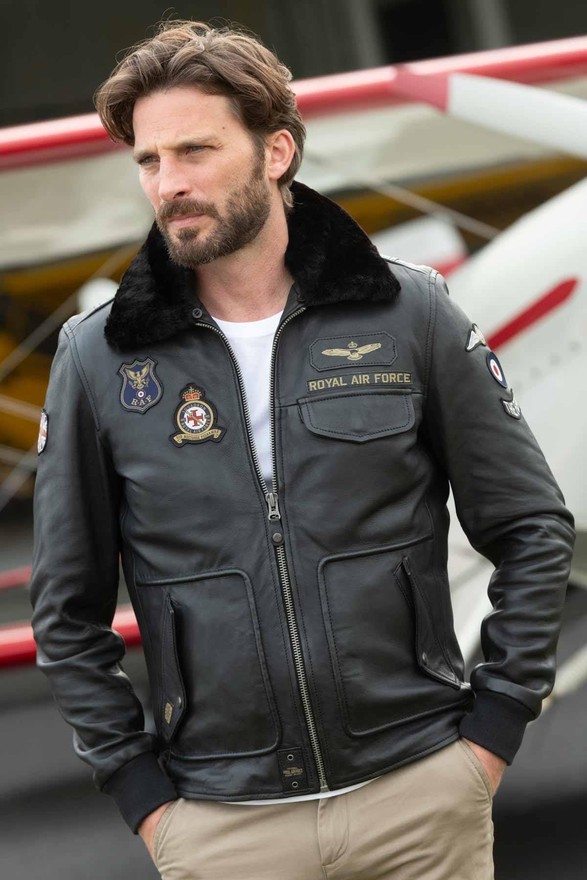 Black RAF-inspired sheepskin jacket with seven patches and fur collar. - Image n°1