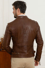 Mid-brown leather jacket with a motard collar and a snug, aged fit. - Image n°2