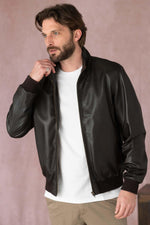 Sober brown leather bombers - Image n°1
