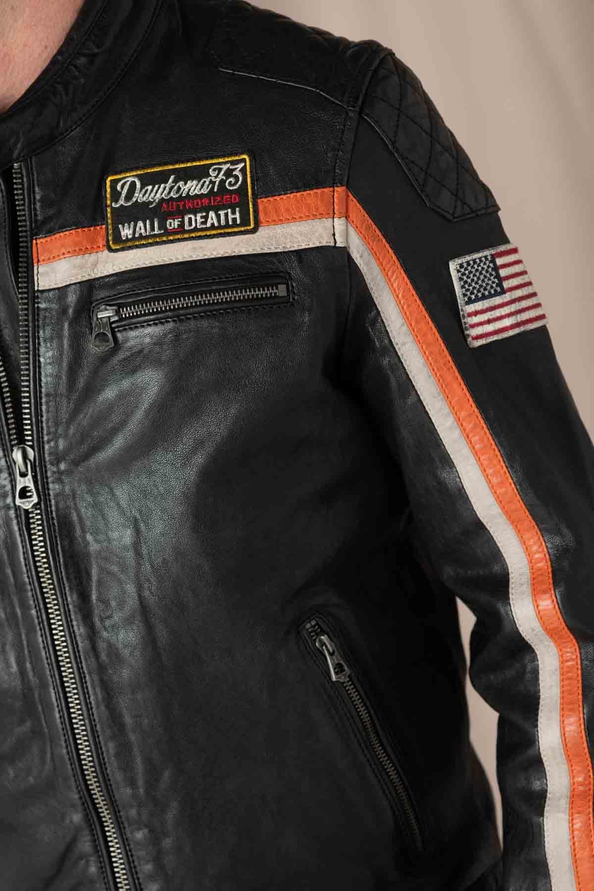 Black lambskin biker jacket with orange accents, sleek and sporty. - Image n°3