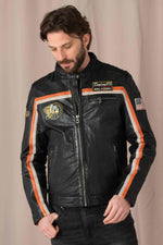 Black lambskin biker jacket with orange accents, sleek and sporty. - Image n°1