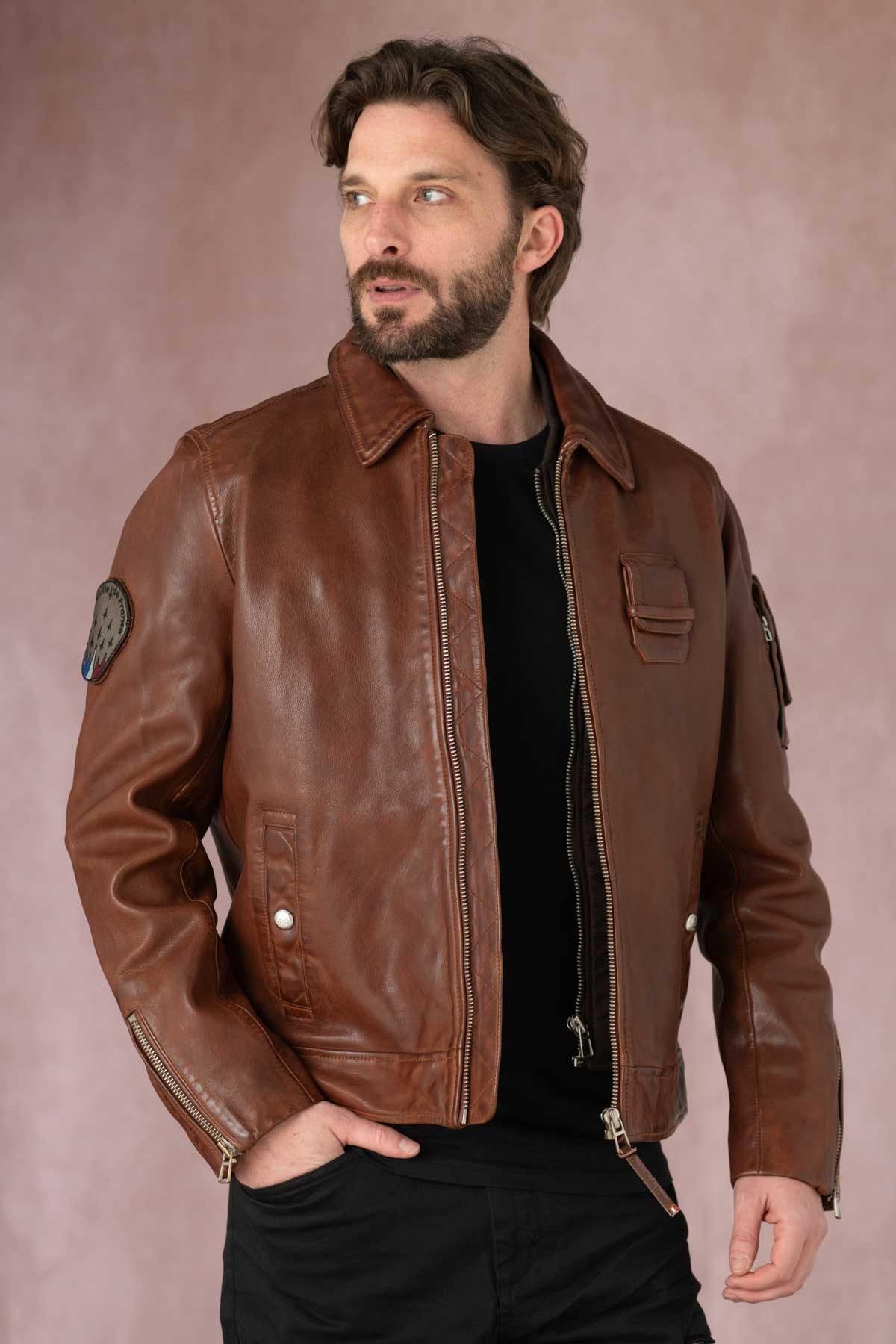 Aviator-style cognac sheepskin jacket, slim cut with practical pockets. - Image n°1