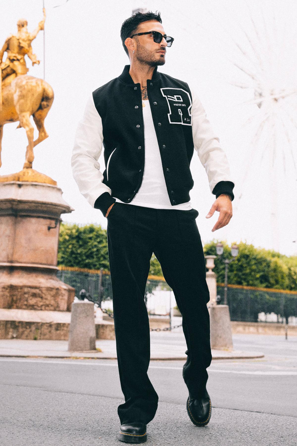 A slim-fit teddy jacket blending leather and nylon for urban style. - Image n°1