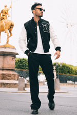 A slim-fit teddy jacket blending leather and nylon for urban style. - Image n°1