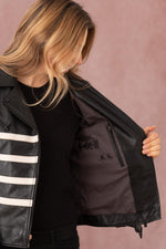 A black lambskin biker jacket, sleek and versatile with a regular cut. - Image n°11