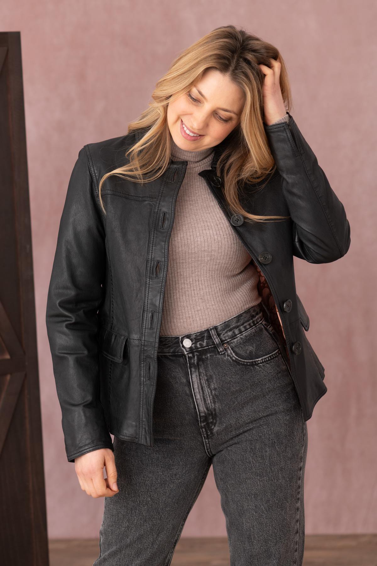 Effortless black lambskin jacket with regular cut and button details. - Image n°1
