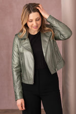 A metallic dark green sheepskin biker jacket, bold and seasonless. - Image n°1