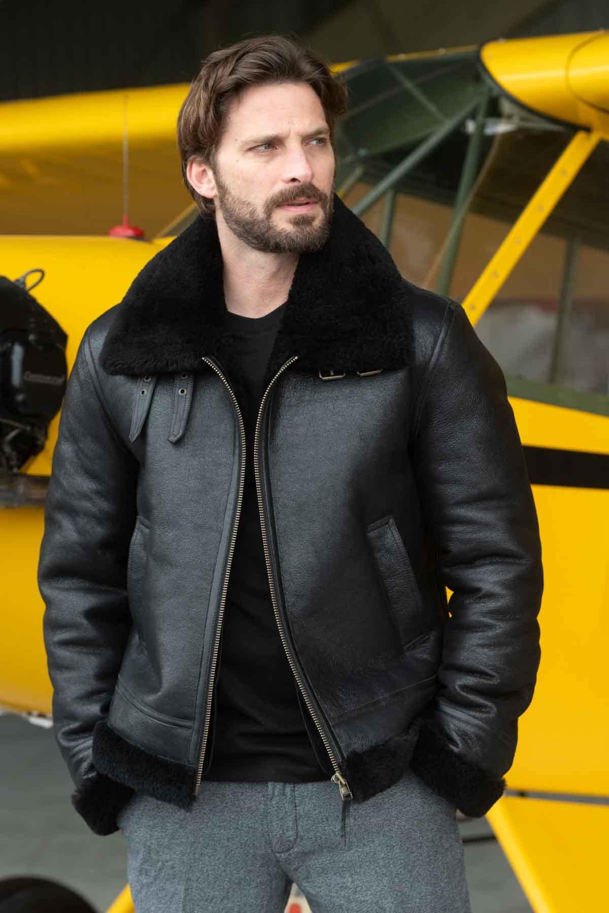 Black reversed sheep leather aviator jacket, fur-lined for warmth. - Image n°1