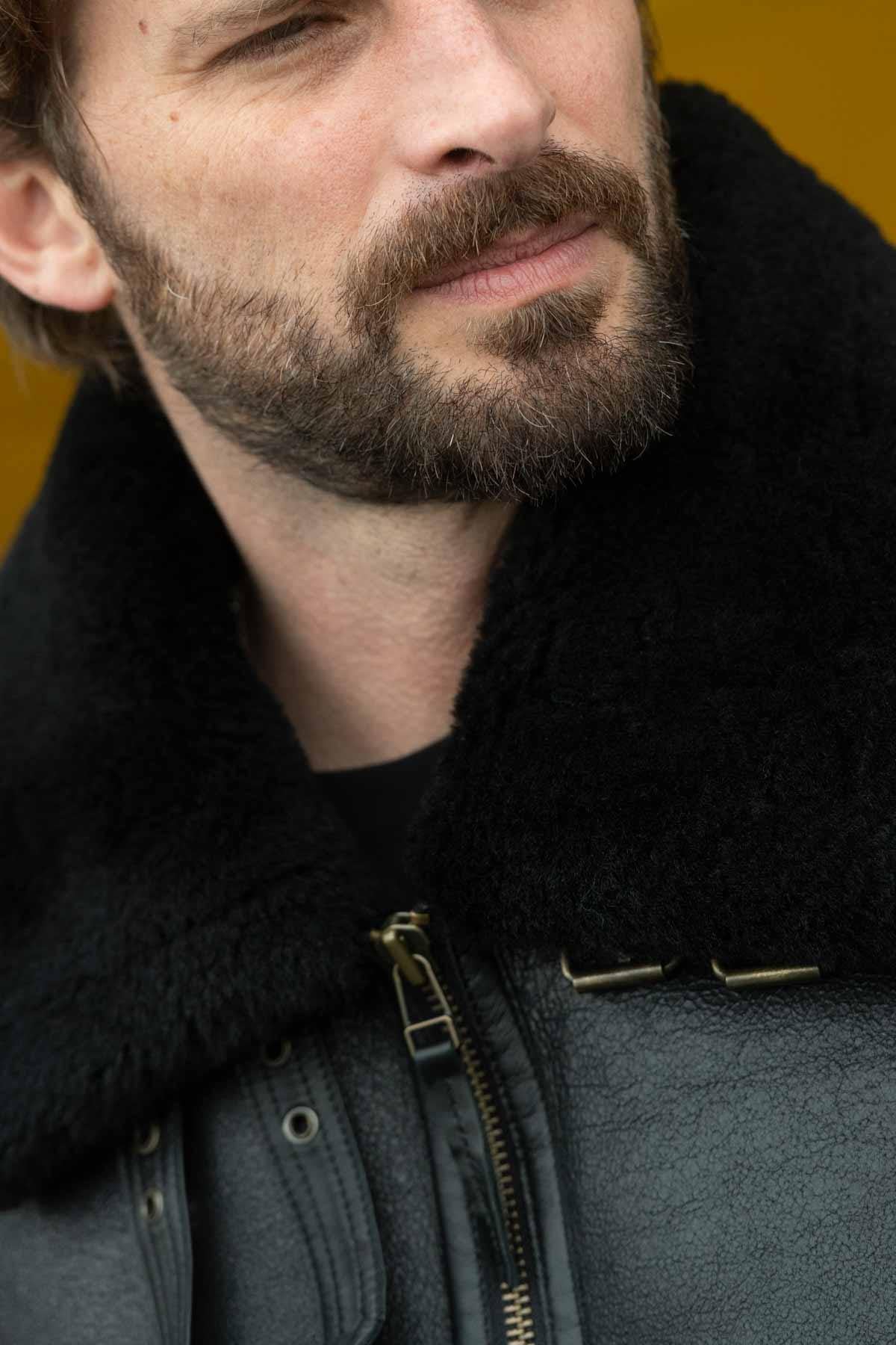 Black reversed sheep leather aviator jacket, fur-lined for warmth. - Image n°7