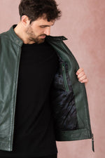 A forest-green lambskin biker jacket by Redskins with snap collar. - Image n°8