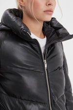 Soft black sheep leather jacket, quilted for warmth and style. - Image n°2