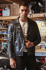 A slim horsehide leather jacket, inspired by 1950s biker classics. - Image n°1