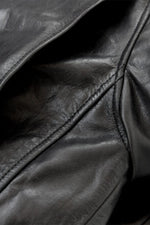 A slim horsehide leather jacket, inspired by 1950s biker classics. - Image n°7