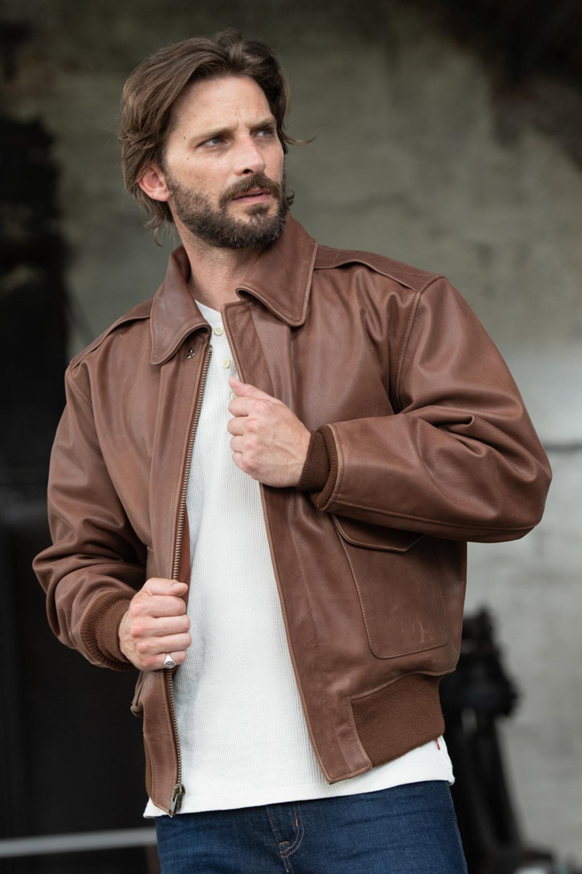 The iconic A-2 in aged russet cowhide, faithfully military-spec. - Image n°1