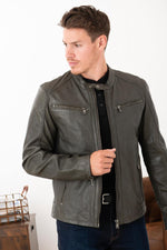 Khaki lambskin moto jacket with a regular fit, rugged yet elegant. - Image n°1