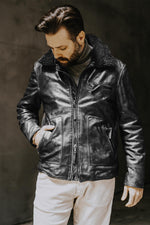 Aged black sheepskin aviator jacket with removable collar. - Image n°1