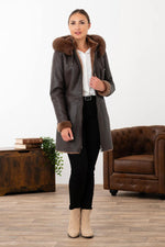 Chocolate lambskin jacket with silky nappa finish and fox-fur hood. - Image n°4