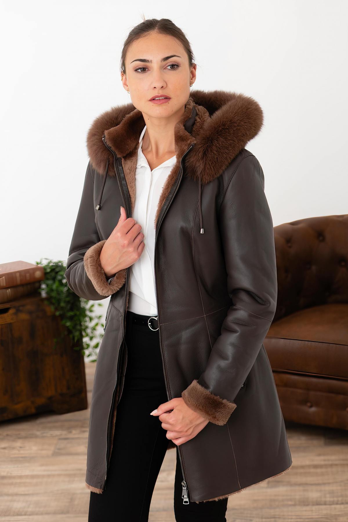 Chocolate lambskin jacket with silky nappa finish and fox-fur hood. - Image n°1