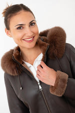 Chocolate lambskin jacket with silky nappa finish and fox-fur hood. - Image n°3