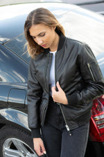 Schott NYC's lambskin bomber: a sleek, fitted MA-1 in soft leather. - Image n°1