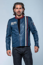 Steve McQueen's 1970s racing legacy in a royal blue sheepskin jacket. - Image n°3