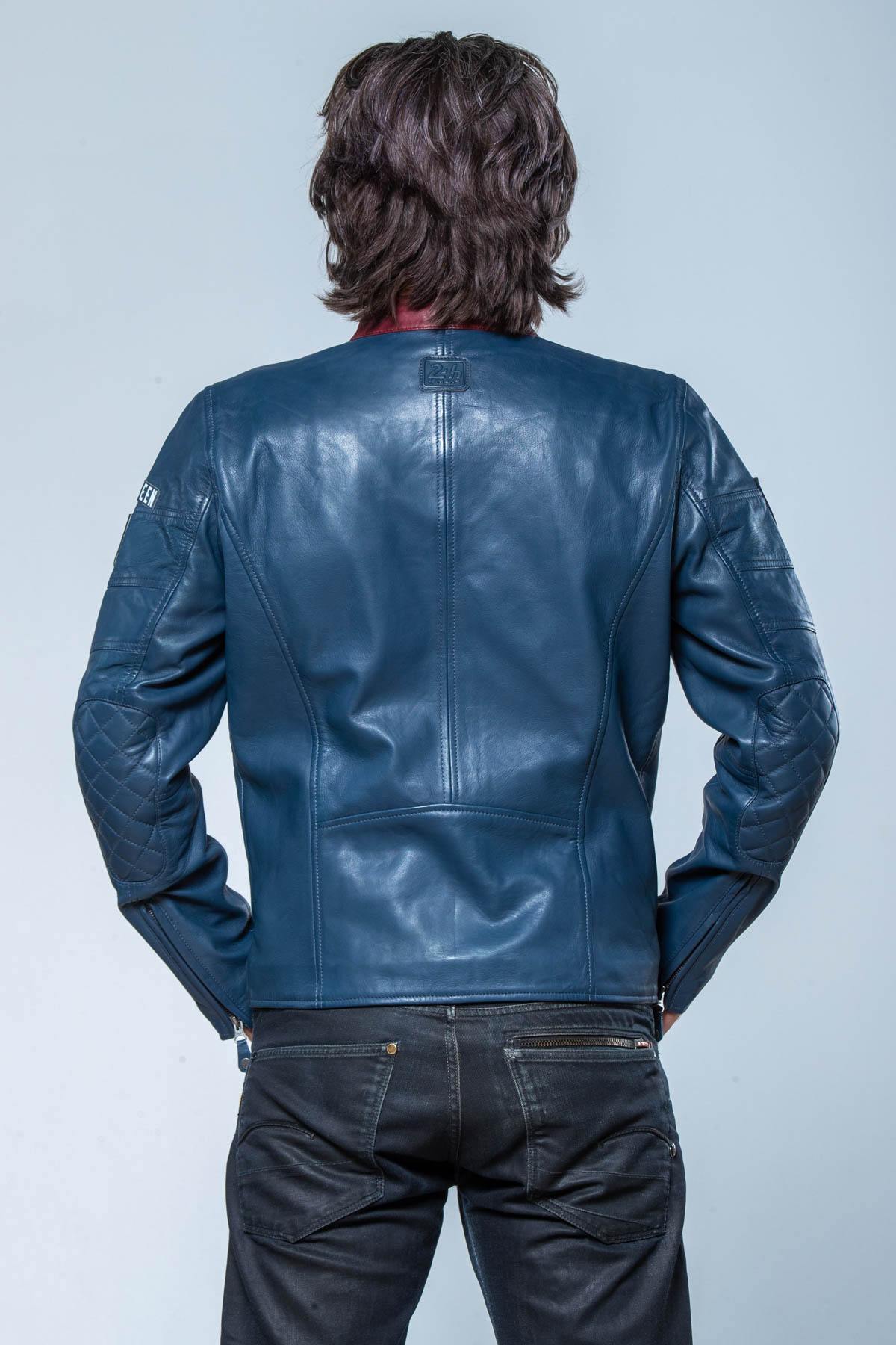 Steve McQueen's 1970s racing legacy in a royal blue sheepskin jacket. - Image n°7