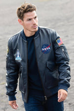 Limited-edition navy sheepskin jacket inspired by Apollo 13's legacy. - Image n°10