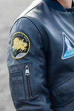 Limited-edition navy sheepskin jacket inspired by Apollo 13's legacy. - Image n°3