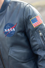 Limited-edition navy sheepskin jacket inspired by Apollo 13's legacy. - Image n°4