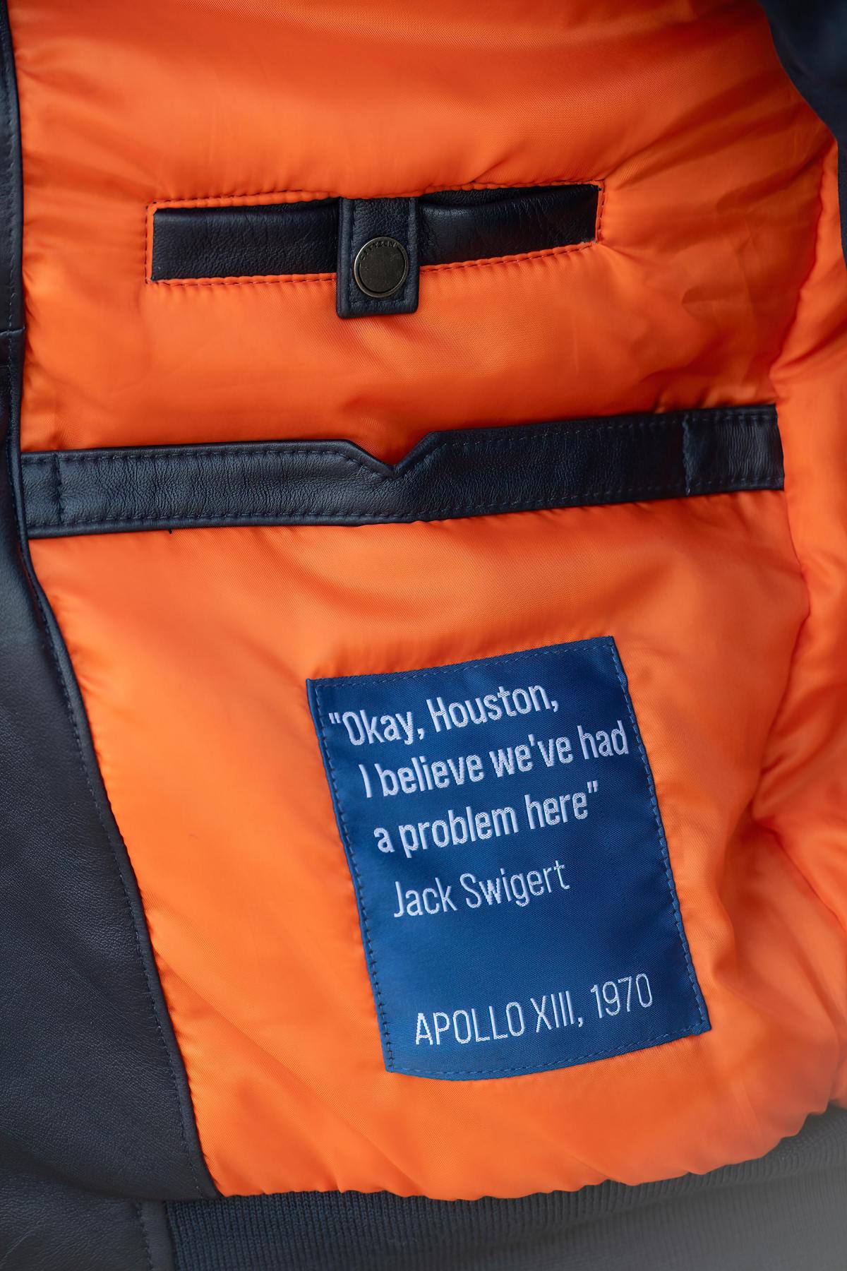 Limited-edition navy sheepskin jacket inspired by Apollo 13's legacy. - Image n°8