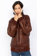 Double-faced moka sheepskin bomber by Schott. Oversized and cosy. - Image n°2