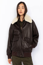A relaxed aviator jacket by Schott, crafted in soft washed lambskin. - Image n°1