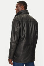 Black lambskin parka with detachable vegan-fur hood for urban warmth. - Image n°3