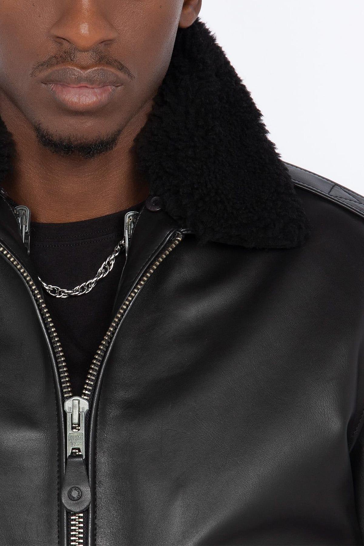 Schott's thick cowhide aviator jacket with removable shearling collar. - Image n°13