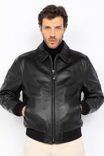 Black cowhide jacket by Schott NYC-timeless, rugged, and versatile. - Image n°1