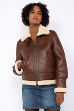 Schott's moka shearling bomber: warm, durable, timeless. - Image n°1
